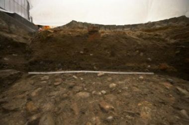 Uncovered and documented cut layers beneath the pavement of the bridge today. | Charles Bridge museum